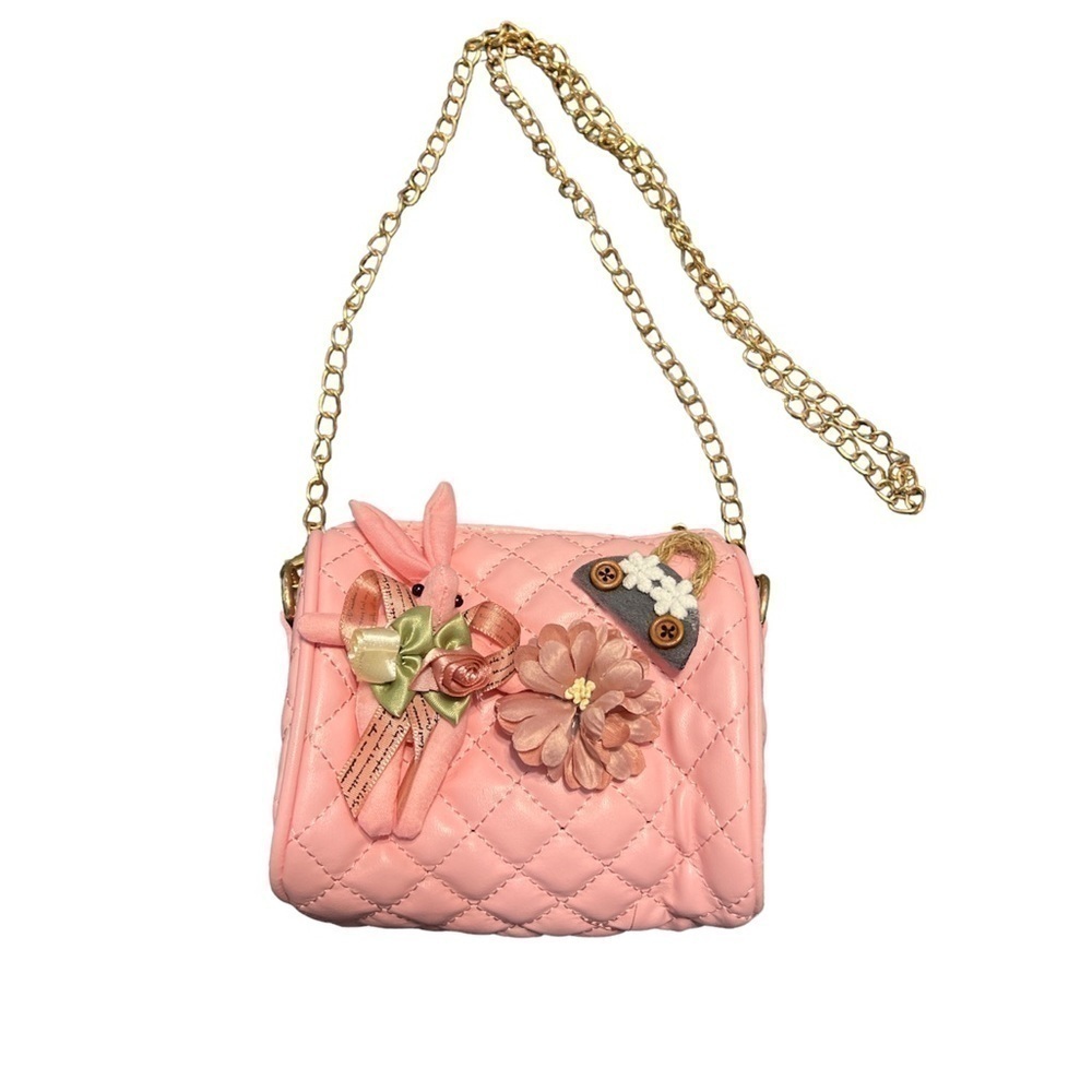 FAUX leather quilted crossbody bag. Pink. NWOT. Gold hardware and zip closure.
